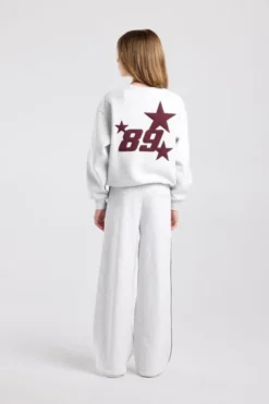 America Today Broeken|Joggingbroeken^Joggingbroek Cassia Jr wide leg joggingbroek met bordeaux piping